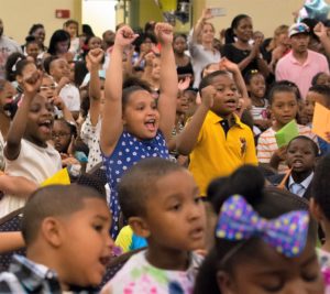 Students celebrate moving up a grade at Setp-Up Day